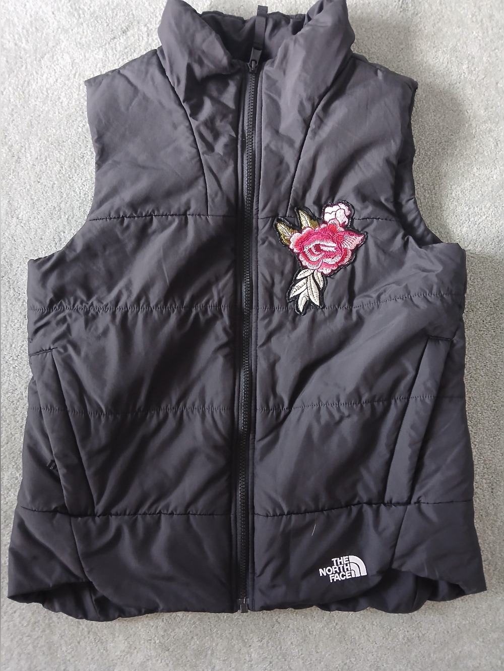 The North Face Black Quilted Vest with Pink Rose Patches